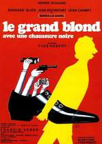 Le Grand Blond avec une chaussure noire Box Art