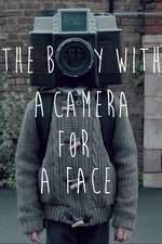 The Boy with a Camera for a Face Box Art